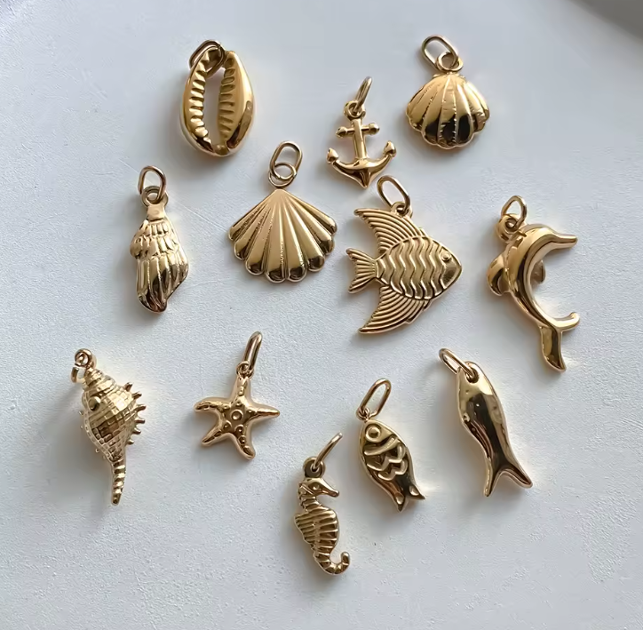 Marine and Animal Charms in gold by Zyrah Collective