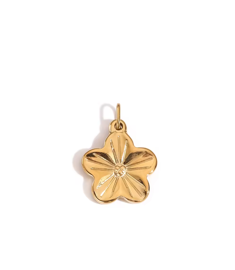 Petalis floral petal charm in gold by Zyrah Collective
