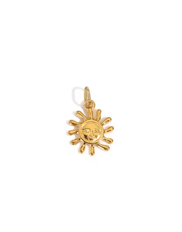 Solaris radiant sun charm in gold by Zyrah Collective
